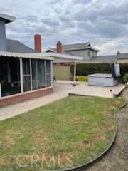 19426 Belshaw Avenue Carson, CA 90746 - Photo 17 of 19 a view of a house with swimming pool