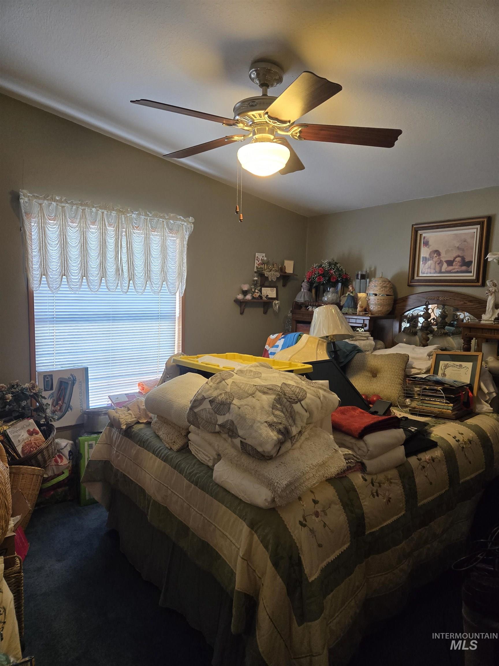 254 Lackey Road Weippe, ID 83553 - Photo 14 of 38 Bedroom featuring ceiling fan