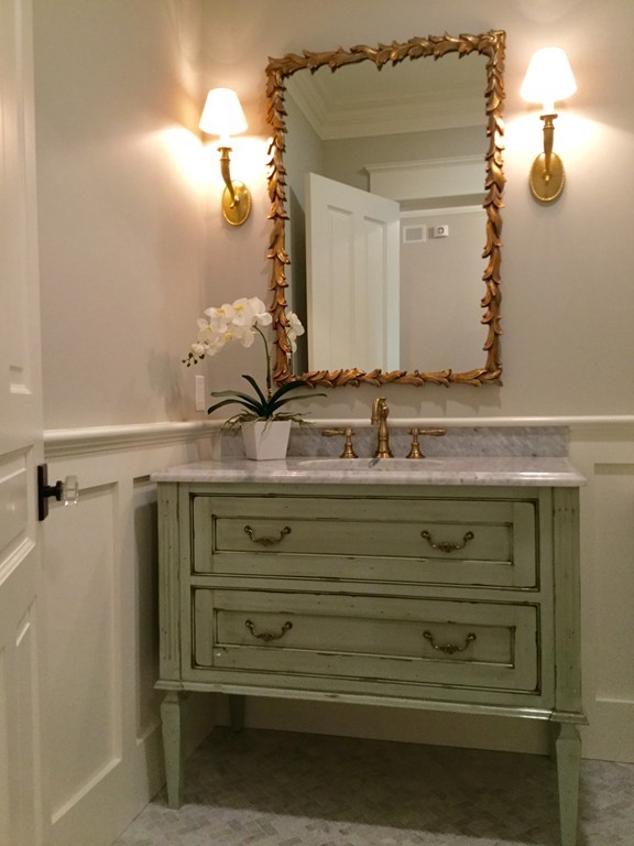 26 Slocum Road Lexington, MA 02421 - Photo 12 of 21 a bathroom with a sink and a mirror