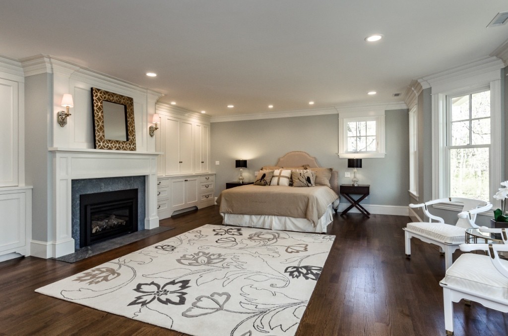 26 Slocum Road Lexington, MA 02421 - Photo 15 of 21 a bed room with a bed furniture and a fireplace