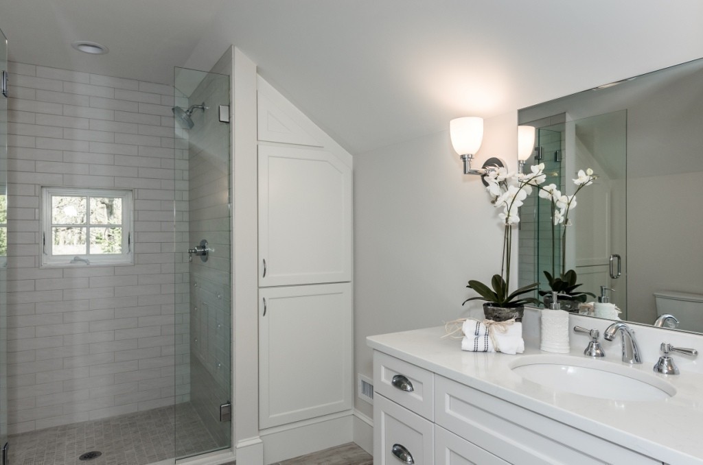 26 Slocum Road Lexington, MA 02421 - Photo 18 of 21 a bathroom with a sink vanity granite and shower