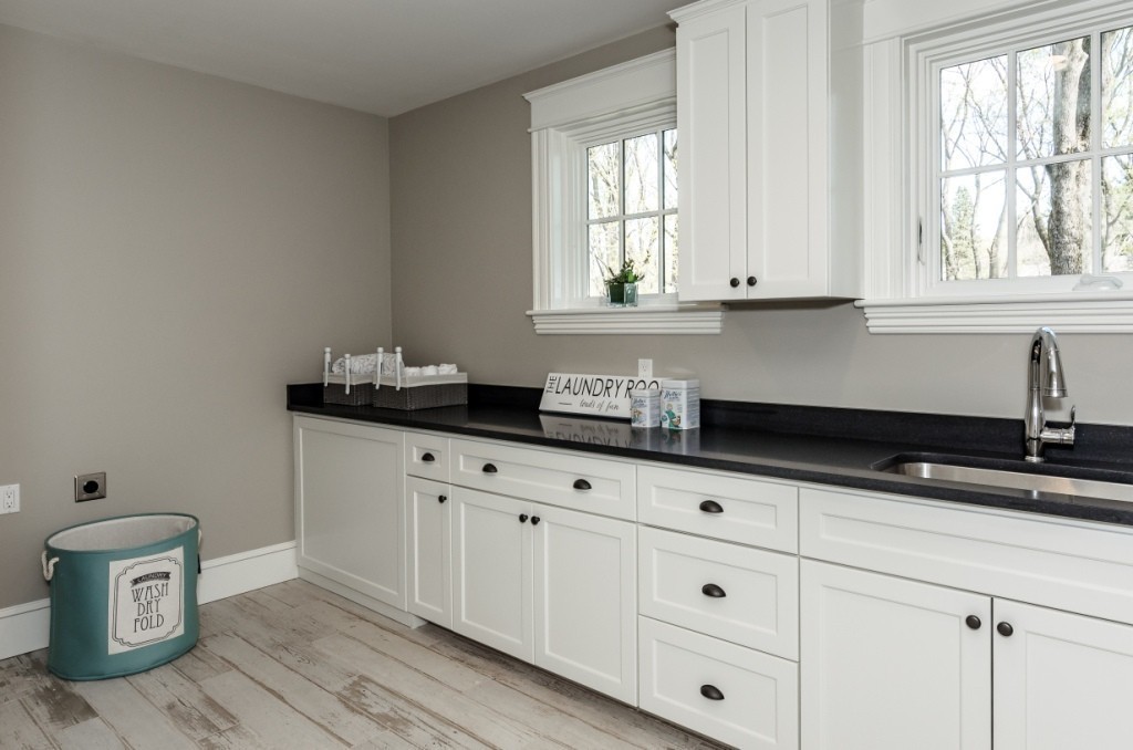 26 Slocum Road Lexington, MA 02421 - Photo 19 of 21 a kitchen with granite countertop white cabinets and window