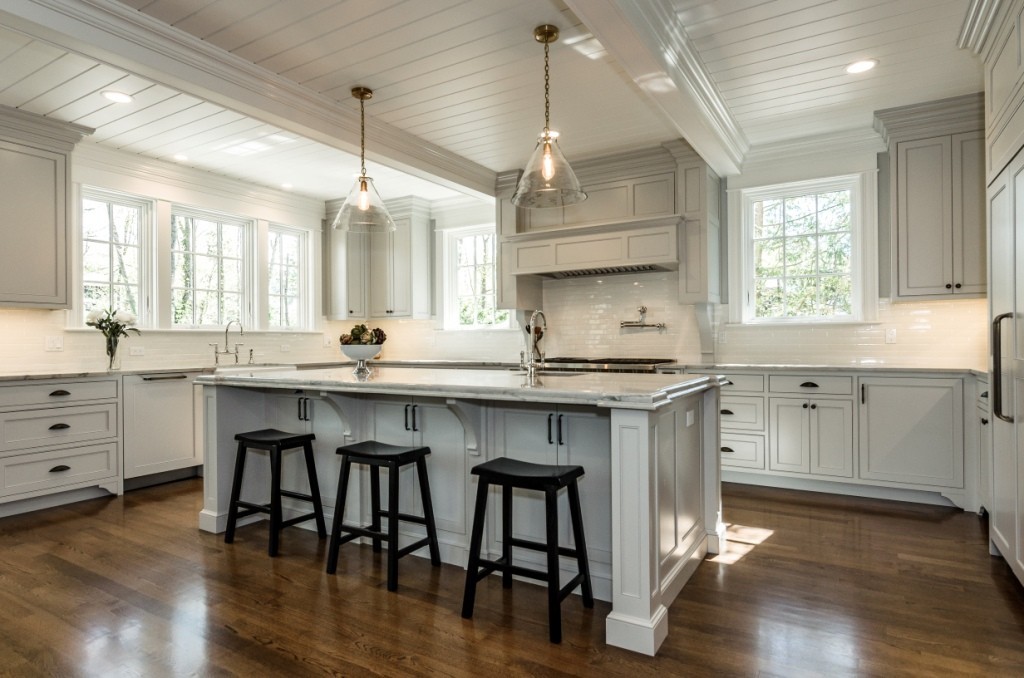 26 Slocum Road Lexington, MA 02421 - Photo 5 of 21 a kitchen with a sink a window and chairs