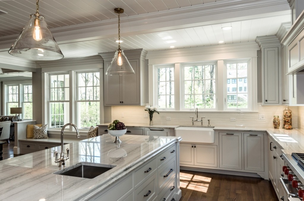 26 Slocum Road Lexington, MA 02421 - Photo 6 of 21 a kitchen with a sink stove and cabinets