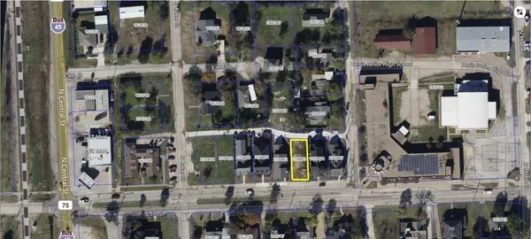 a front view of a building with street view