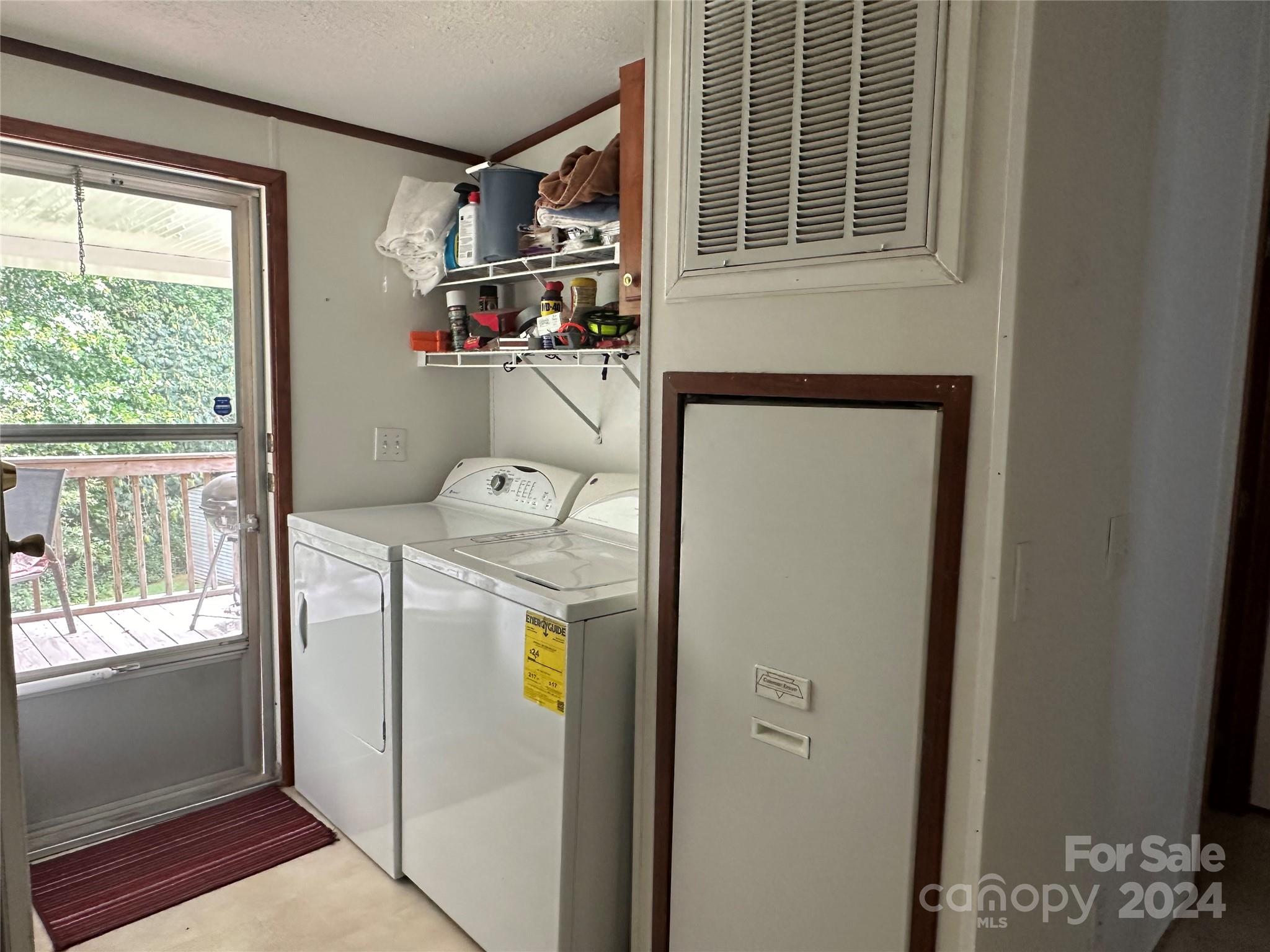 7014 Riverbend Road Claremont, NC 28610 - Photo 18 of 21 a utility room with dryer and washer