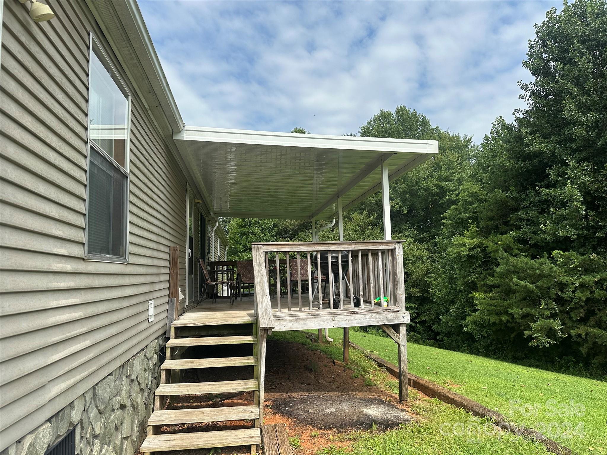 7014 Riverbend Road Claremont, NC 28610 - Photo 19 of 21 a view of outdoor space and yard