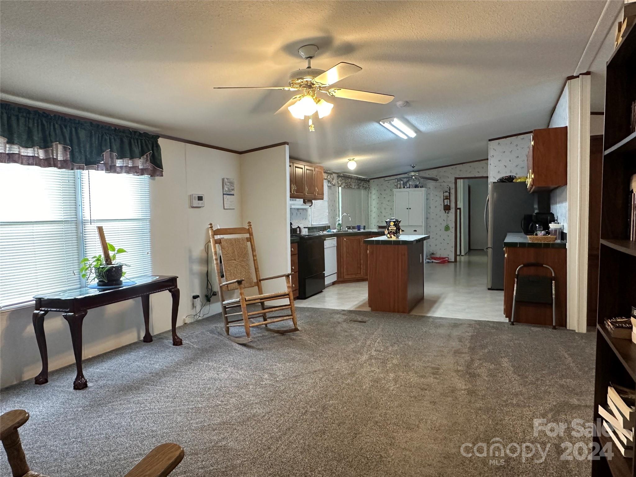 7014 Riverbend Road Claremont, NC 28610 - Photo 9 of 21 a view of a livingroom with furniture and a window