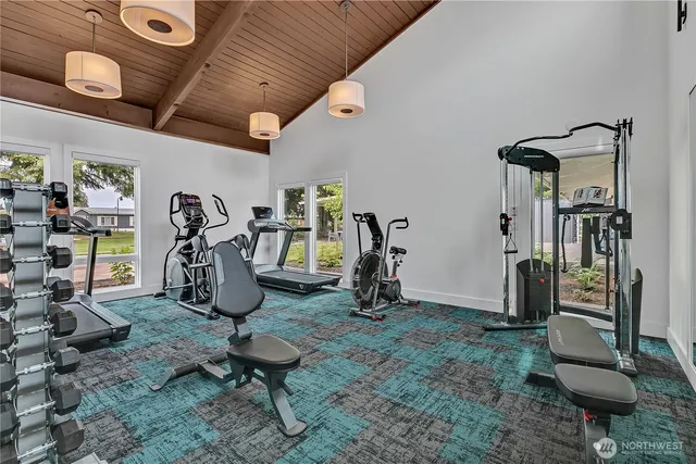 a room with lots of gym equipment