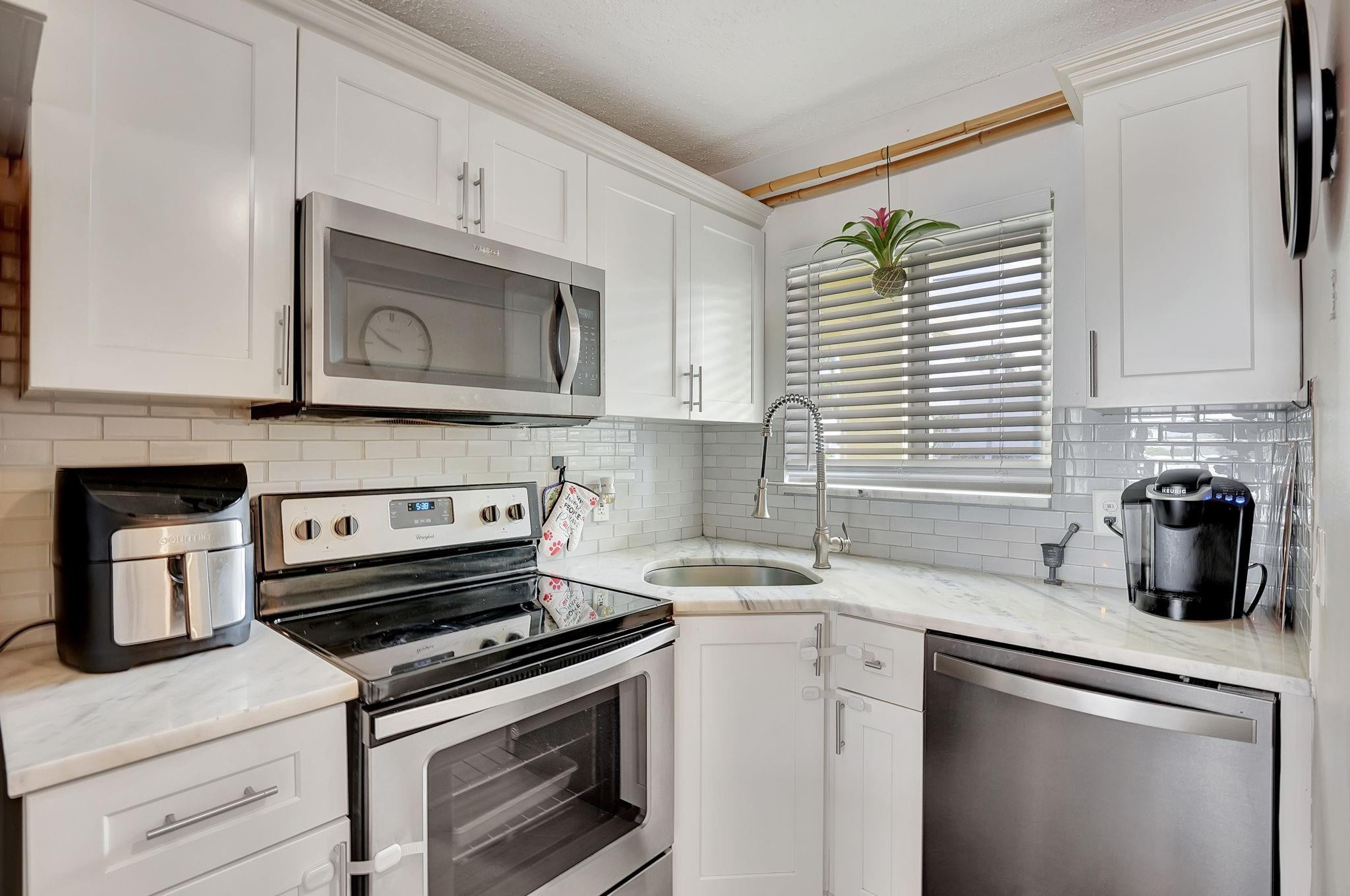 2311 Northeast 36th Street, Unit 1F Lighthouse Point, FL 33064 - Photo 14 of 35 Clean Lines and sunlight
