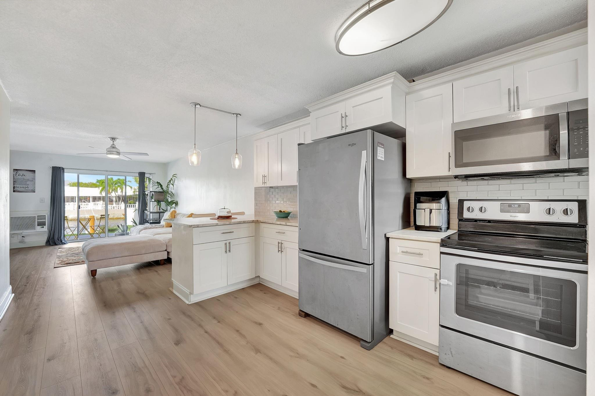 2311 Northeast 36th Street, Unit 1F Lighthouse Point, FL 33064 - Photo 15 of 35 Water views from kitchen