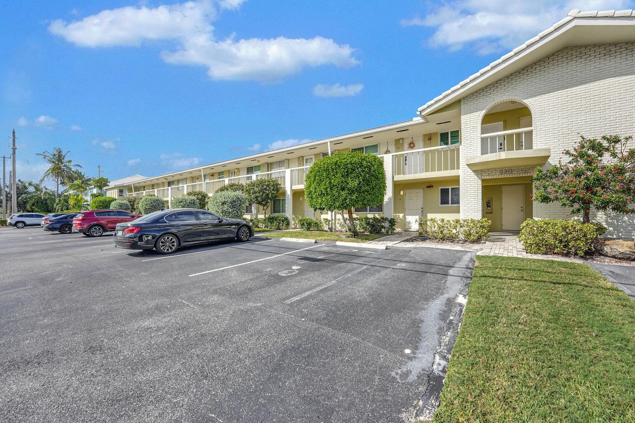 2311 Northeast 36th Street, Unit 1F Lighthouse Point, FL 33064 - Photo 34 of 35 Parking steps to Front door