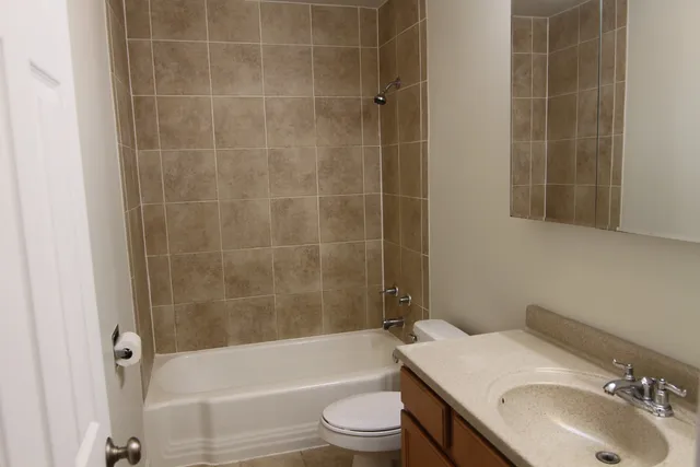 a backyard of a house with outdoor seating