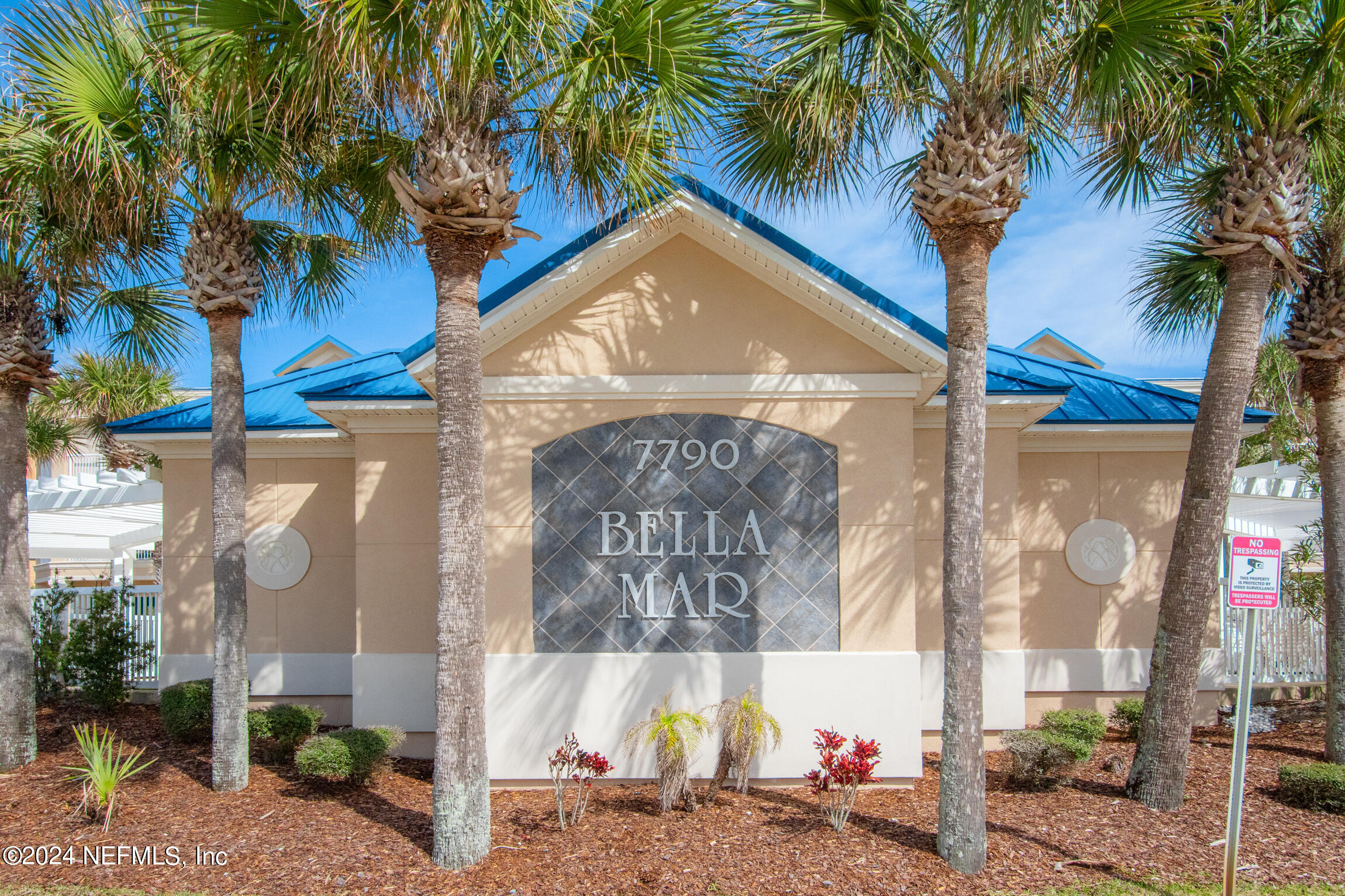 7790 A1A South, Unit 101 St. Augustine, FL 32080 - Photo 2 of 79 a view of a house with a palm tree