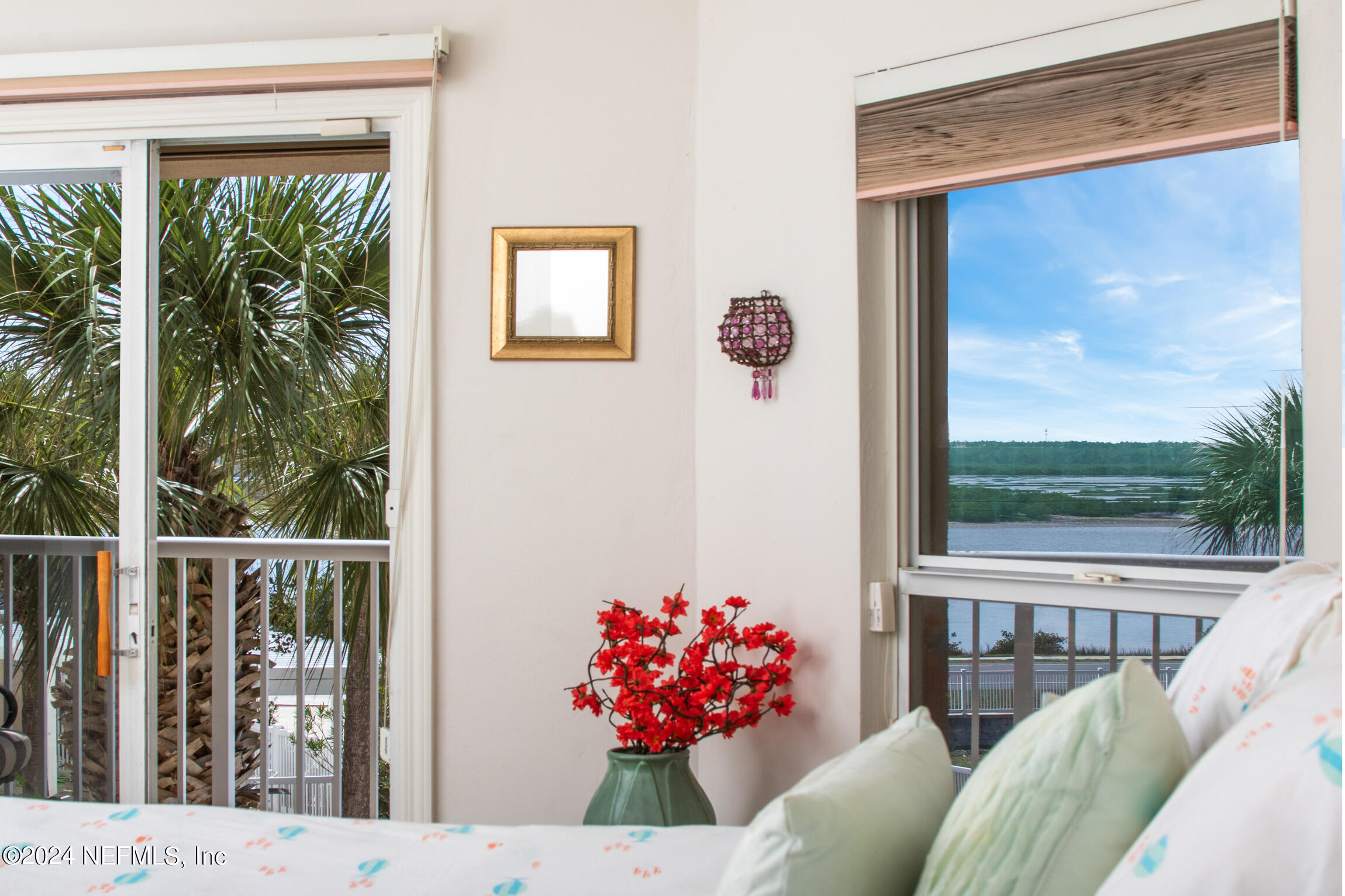 7790 A1A South, Unit 101 St. Augustine, FL 32080 - Photo 36 of 79 a view of a porch with furniture