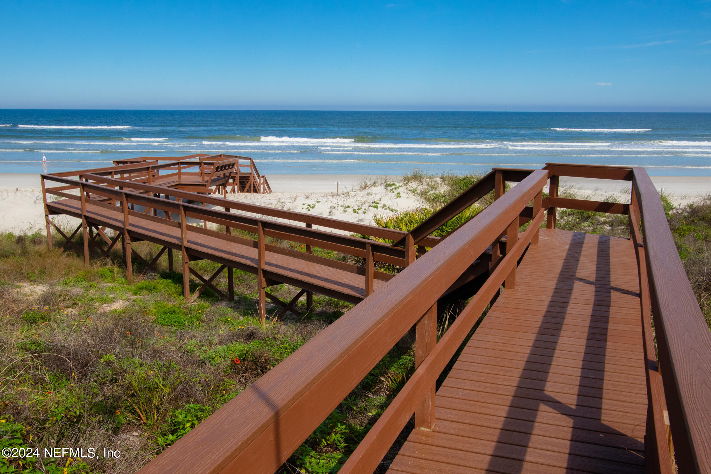 7790 A1A South, Unit 101 St. Augustine, FL 32080 - Photo 46 of 79 a view of a chairs and table on the balcony