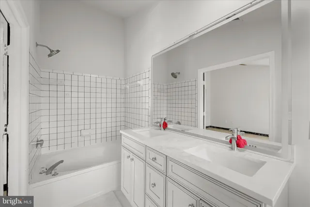 a bathroom with a sink and a tub