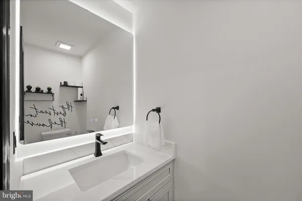 a bathroom with a sink and a bathtub