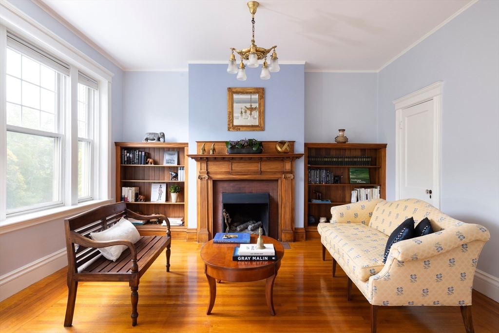 487 Boylston Street, Unit 3 Brookline, MA 02445 - Photo 5 of 14 a living room with furniture fireplace and window