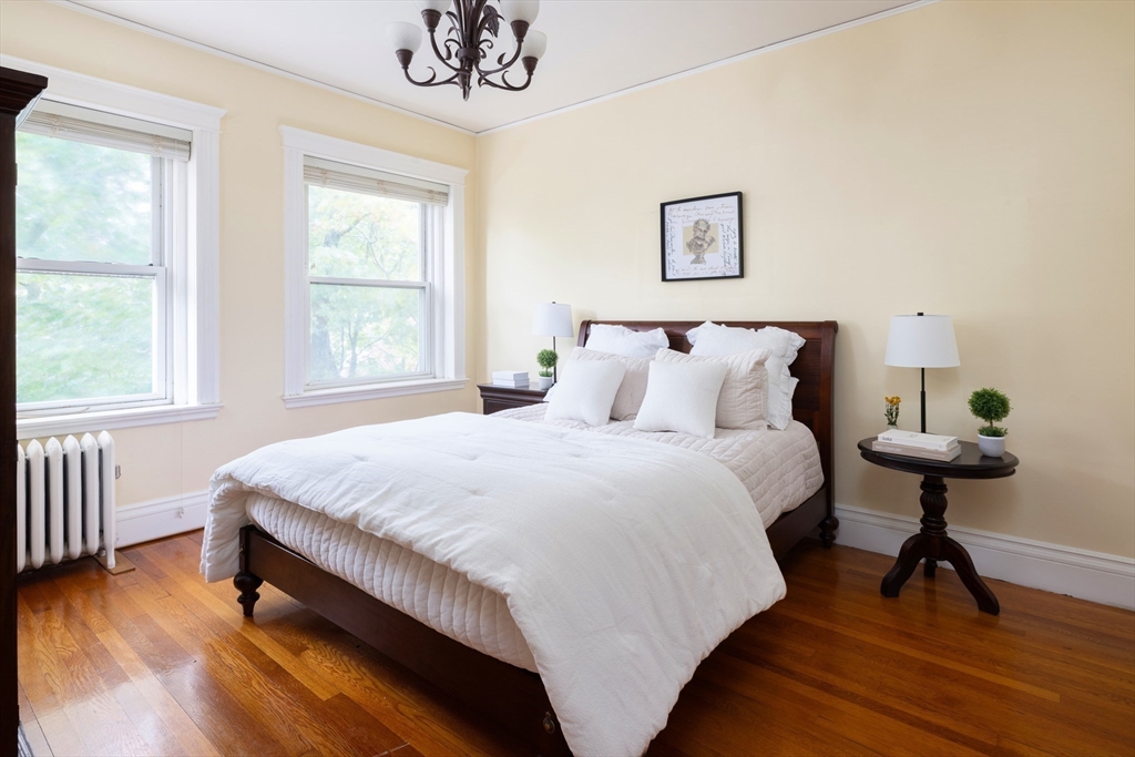 487 Boylston Street, Unit 3 Brookline, MA 02445 - Photo 7 of 14 a bedroom with bed and a window