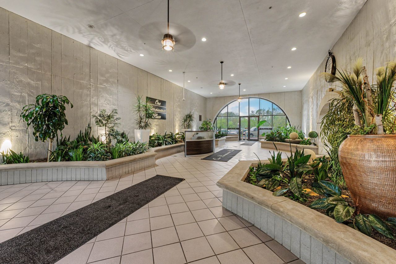 1 Renaissance Place, Unit 1105 Palatine, IL 60067 - Photo 3 of 21 a lobby with furniture and a potted plant