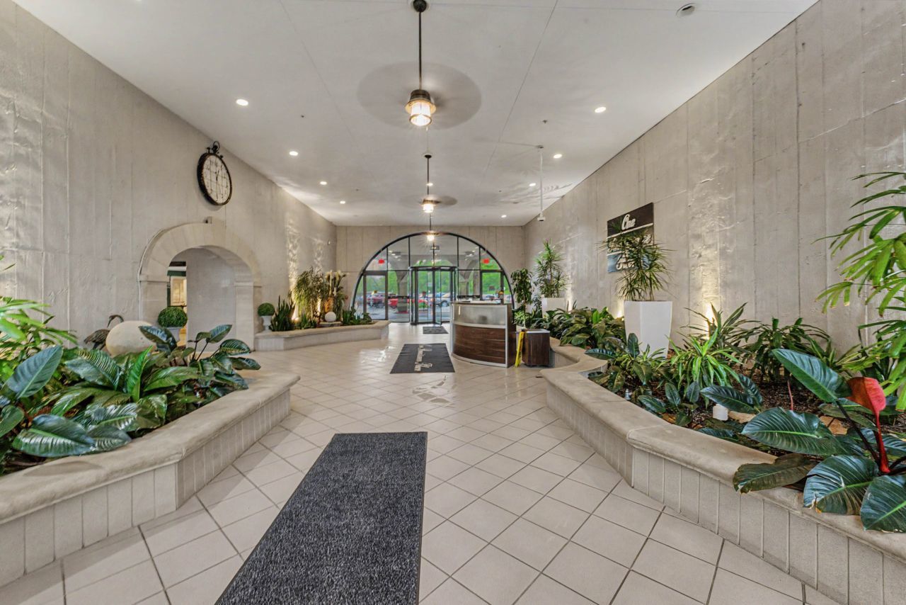 1 Renaissance Place, Unit 1105 Palatine, IL 60067 - Photo 4 of 21 a lobby with furniture and a potted plant