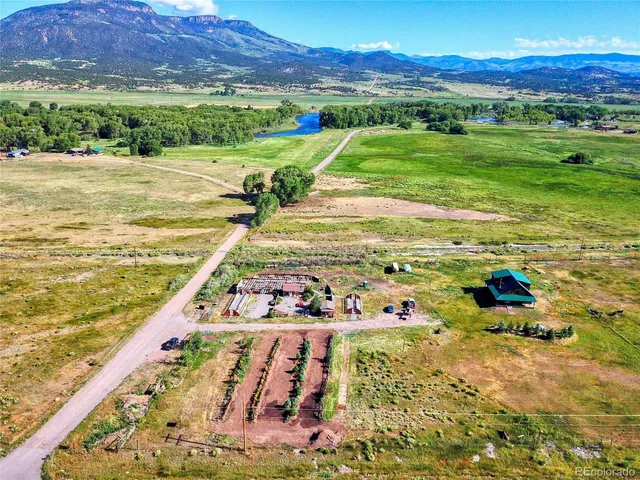a view of an ocean and a mountain