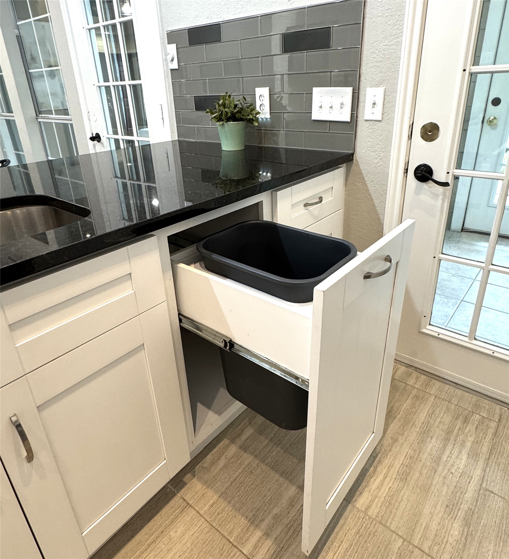 3809 Spicewood Springs Road, Unit 137 Austin, TX 78759 - Photo 24 of 34 Seamlessly integrated waste basket too!