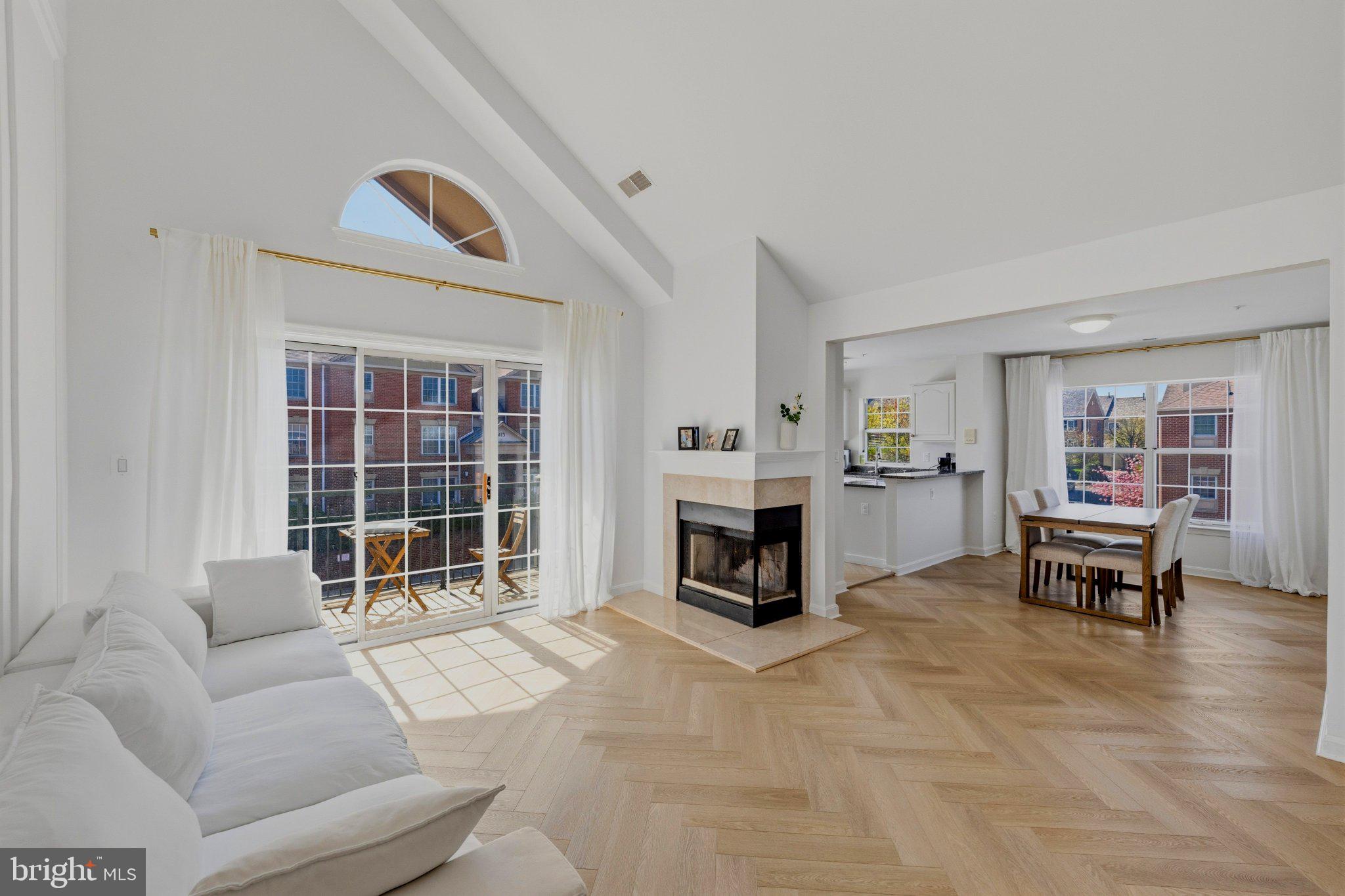 408 Ridgepoint Place, Unit 40838 Gaithersburg, MD 20878 - Photo 4 of 38 Bright and airy open living space.
