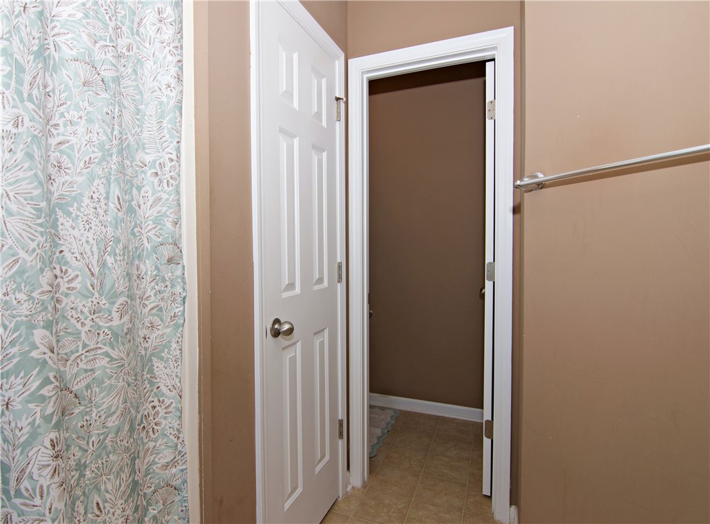 305 North Chestnut Street Seneca, SC 29678 - Photo 26 of 44 Functional bathroom features a neutral color palette and durable flooring.