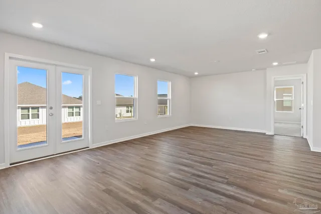 a view of kitchen with wooden floor