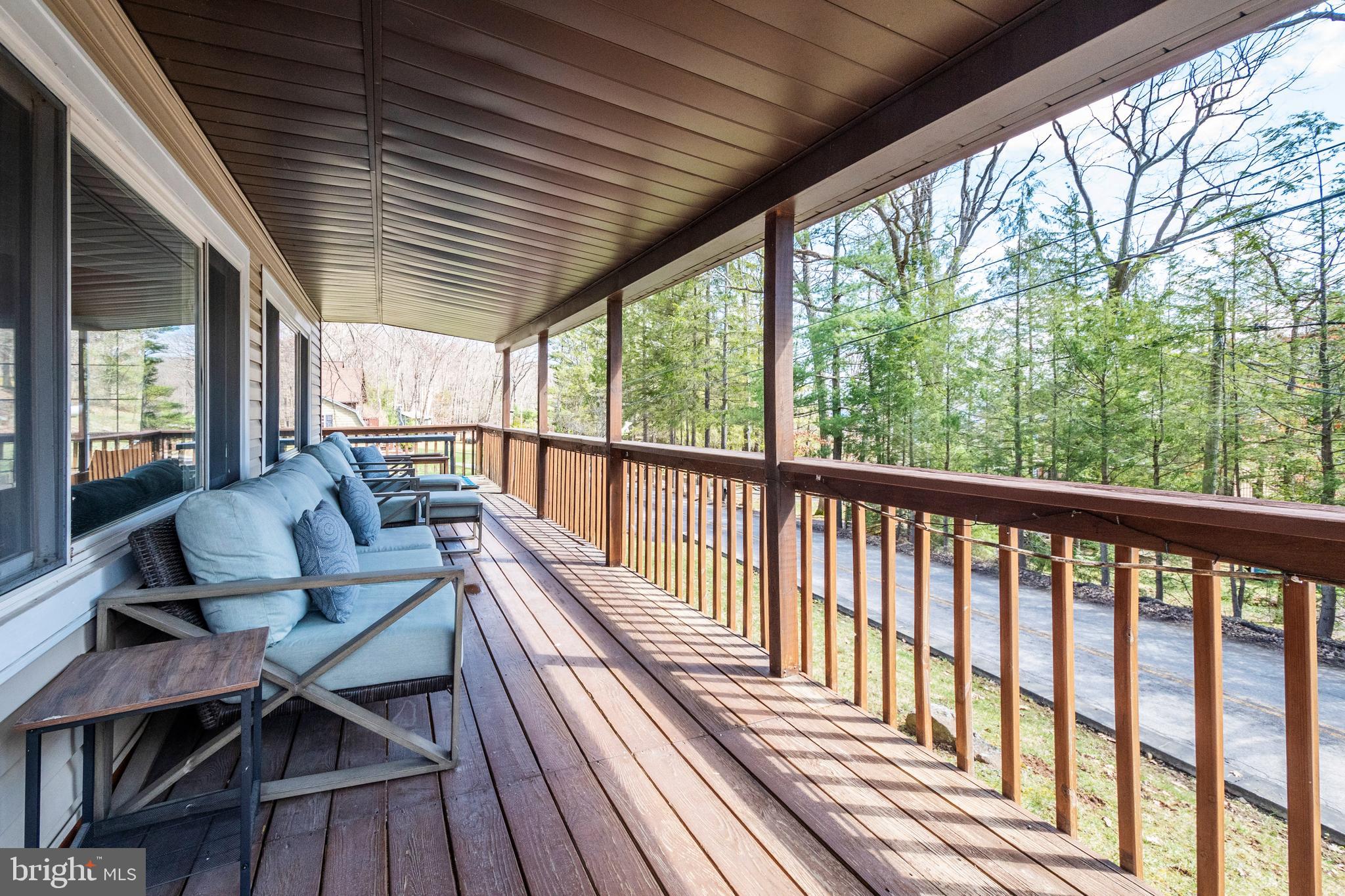 16 Jrs Drive McHenry, MD 21541 - Photo 12 of 57 a view of balcony with wooden floor and outdoor seating
