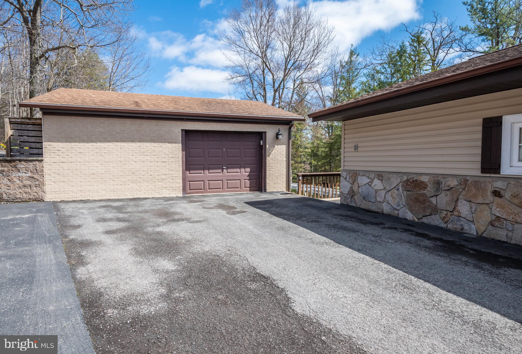16 Jrs Drive McHenry, MD 21541 - Photo 15 of 57 a view of a house with a garage