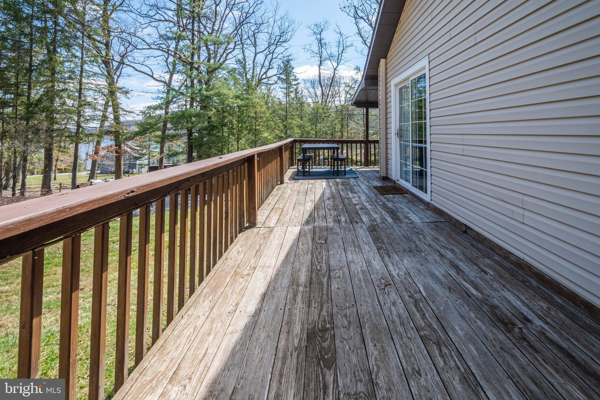 16 Jrs Drive McHenry, MD 21541 - Photo 16 of 57 a view of balcony with wooden floor and fence