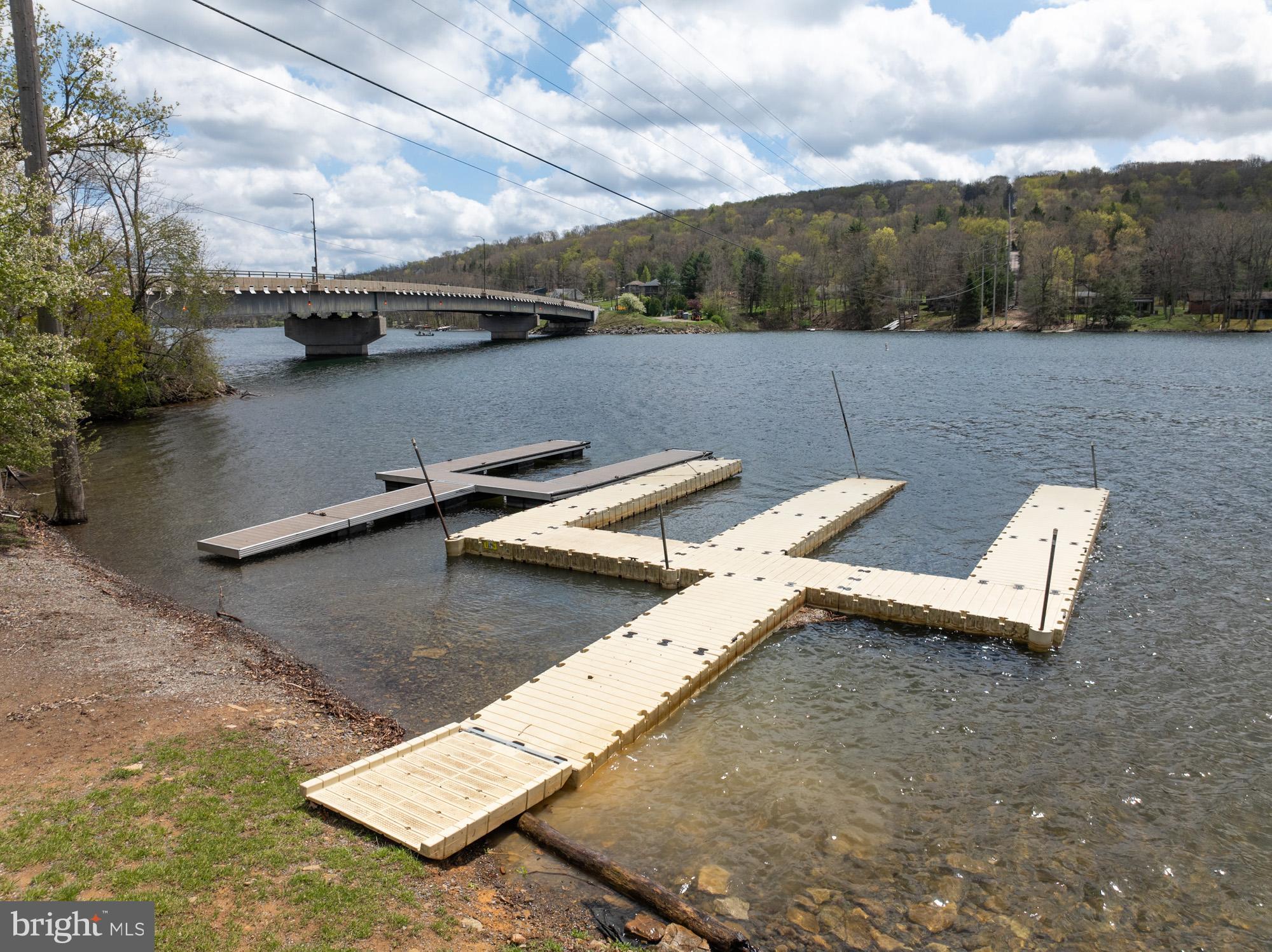16 Jrs Drive McHenry, MD 21541 - Photo 2 of 57 a view of a roof deck with couches and sky view
