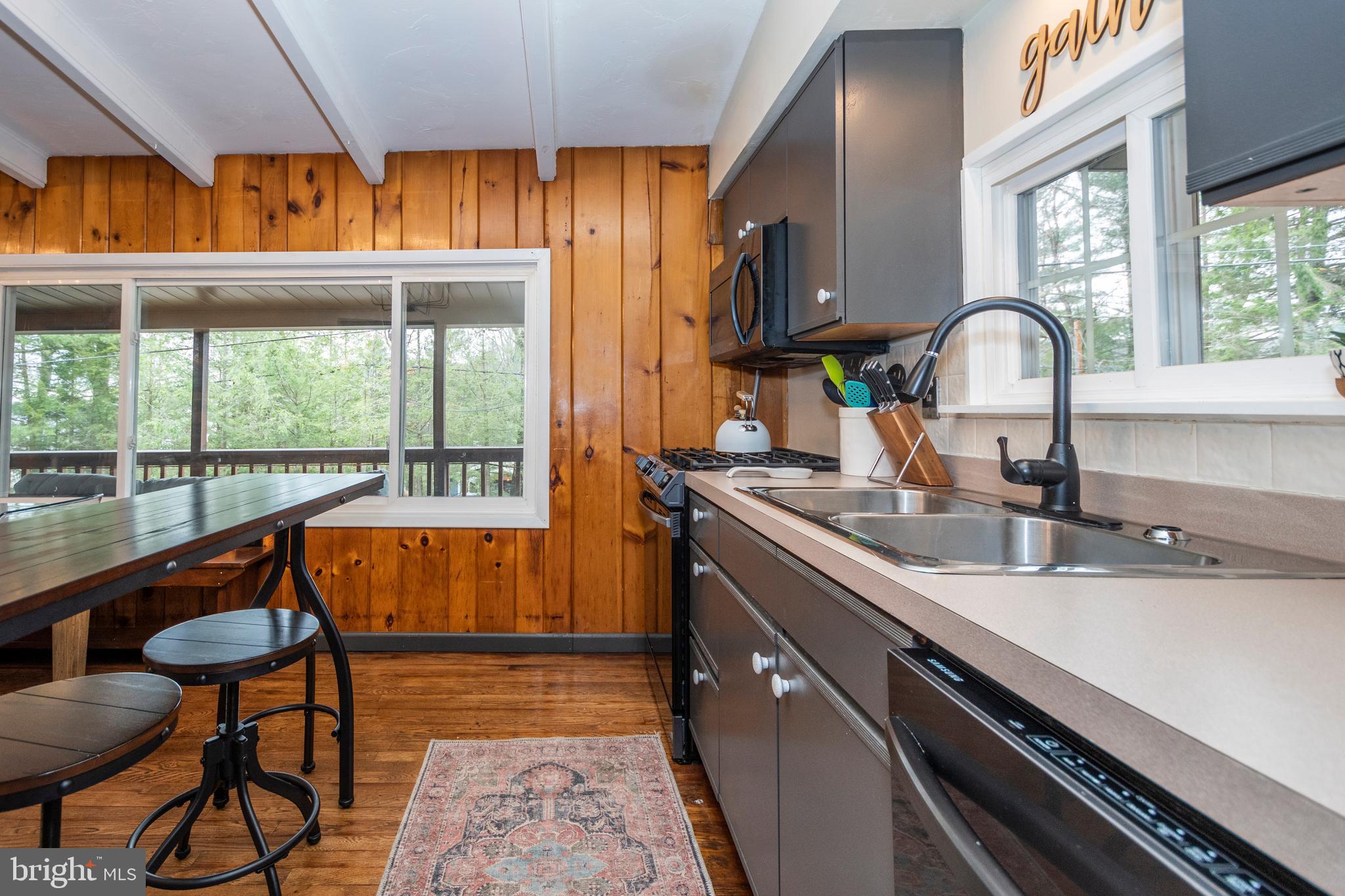 16 Jrs Drive McHenry, MD 21541 - Photo 28 of 57 a blue kitchen with a large window