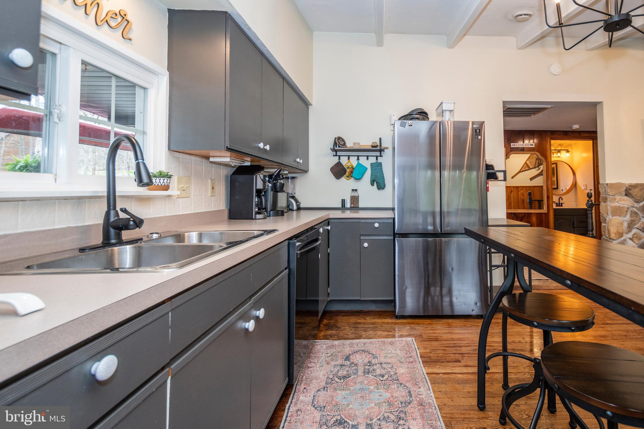 16 Jrs Drive McHenry, MD 21541 - Photo 29 of 57 a kitchen with stainless steel appliances granite countertop sink stove and cabinets
