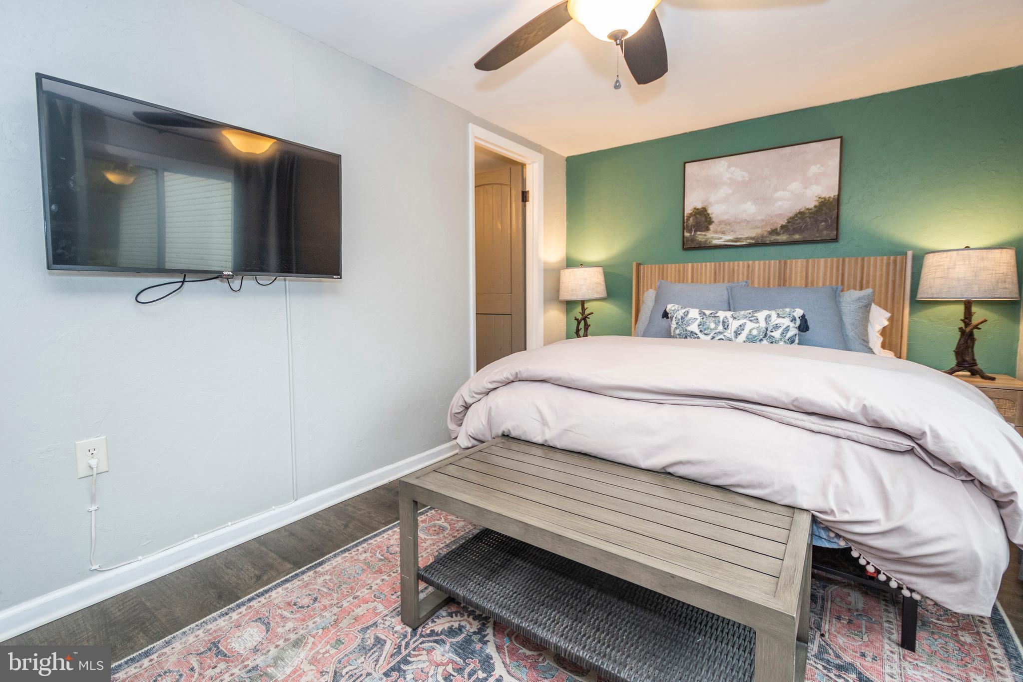 16 Jrs Drive McHenry, MD 21541 - Photo 41 of 57 a bedroom with a bed and a television