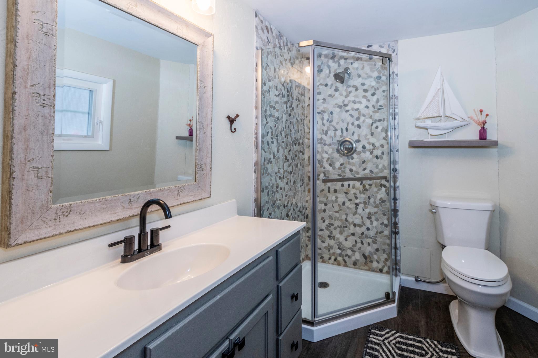 16 Jrs Drive McHenry, MD 21541 - Photo 44 of 57 a bathroom with a sink a toilet and shower