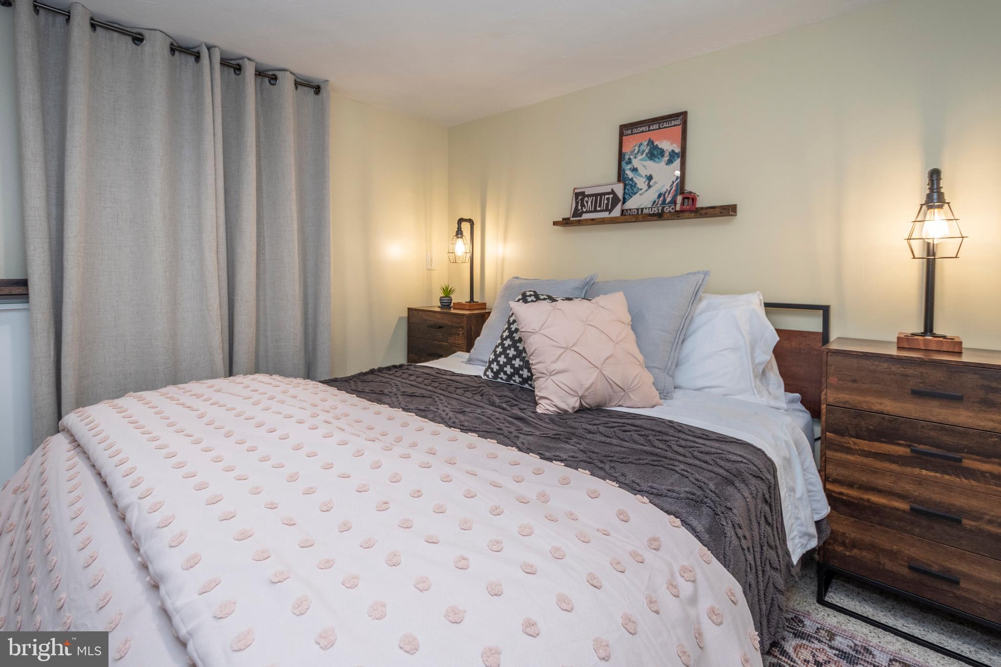 16 Jrs Drive McHenry, MD 21541 - Photo 48 of 57 a bedroom with a bed and a lamp