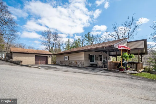 a house with trees in front of it