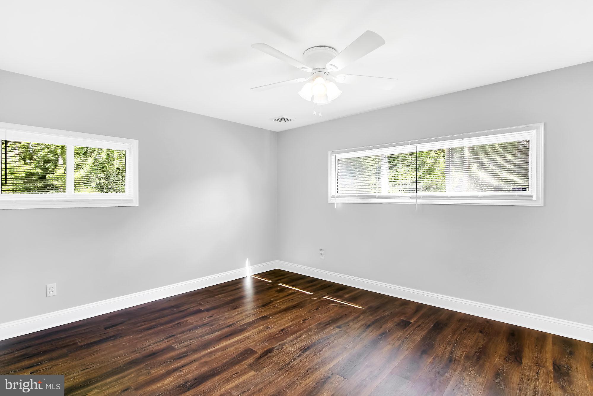 38 Kollman Drive Newark, DE 19713 - Photo 12 of 23 a view of a room with wooden floor and windows