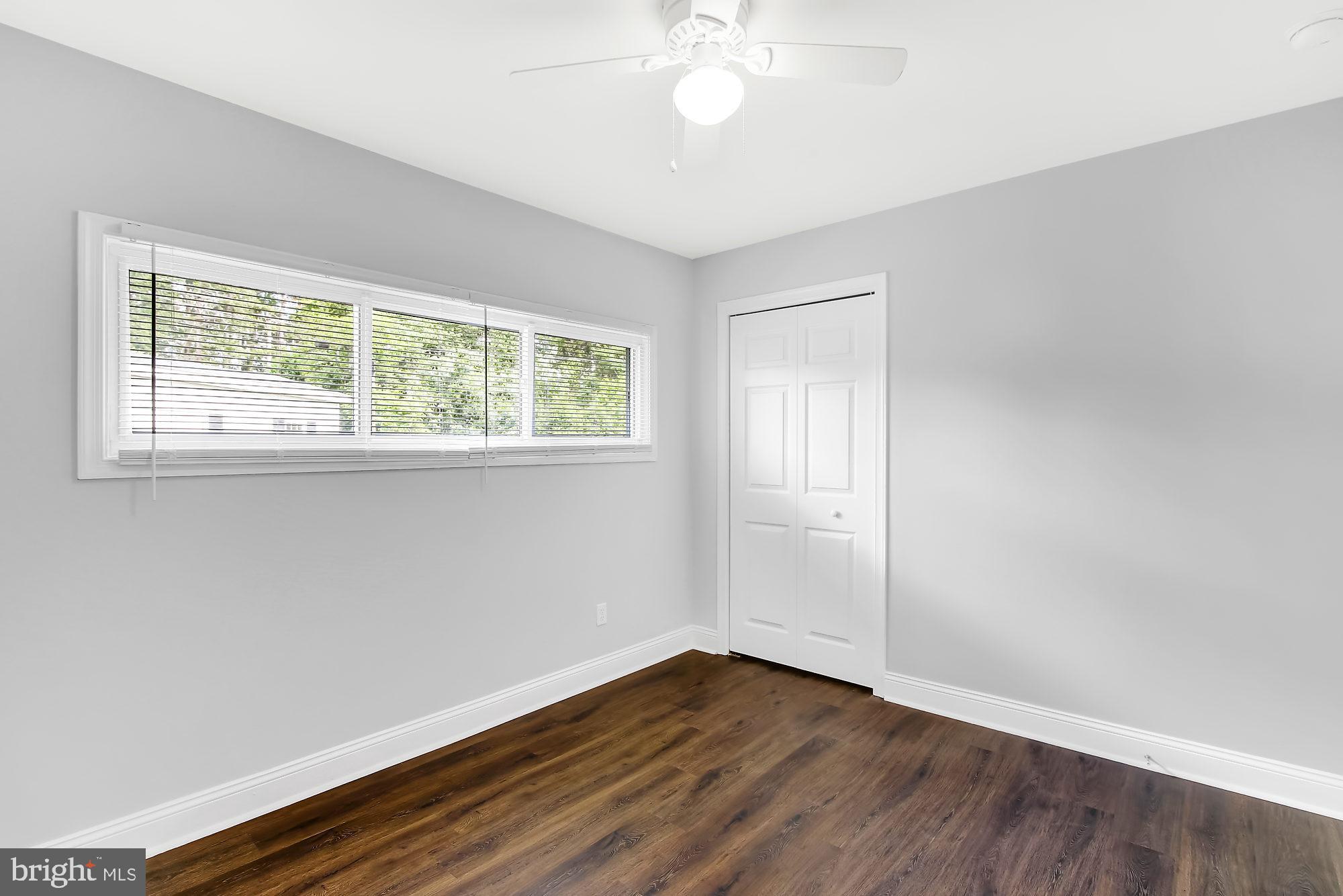 38 Kollman Drive Newark, DE 19713 - Photo 19 of 23 a view of an empty room with wooden floor and a window