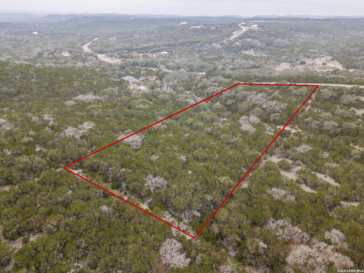 Cr 2763-lot 439 Bear Spring Ranch Mico, TX 78056 - Photo 4 of 9 a view of a field