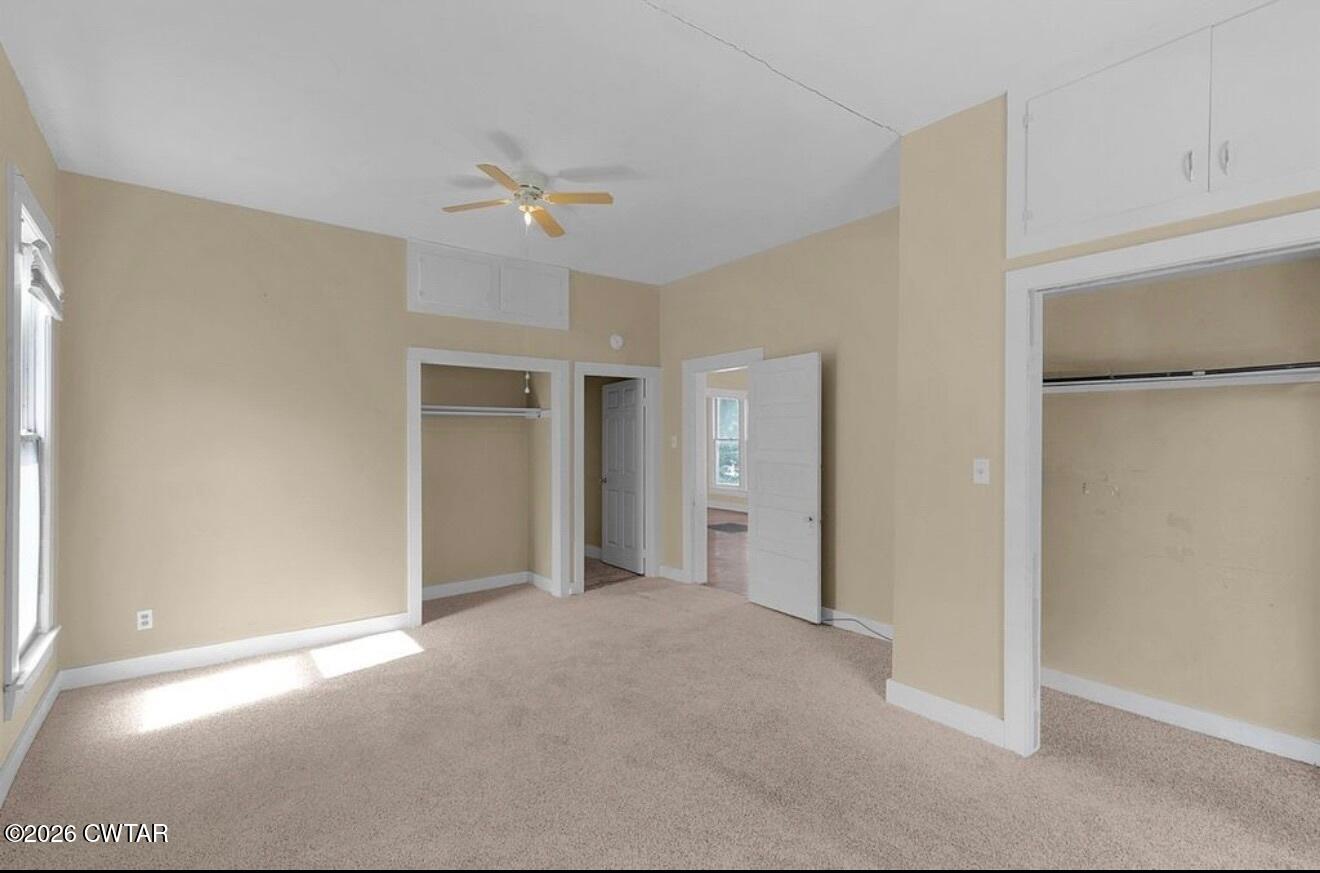 125 Williams Street Jackson, TN 38301 - Photo 15 of 17 a view of empty room with ceiling fan