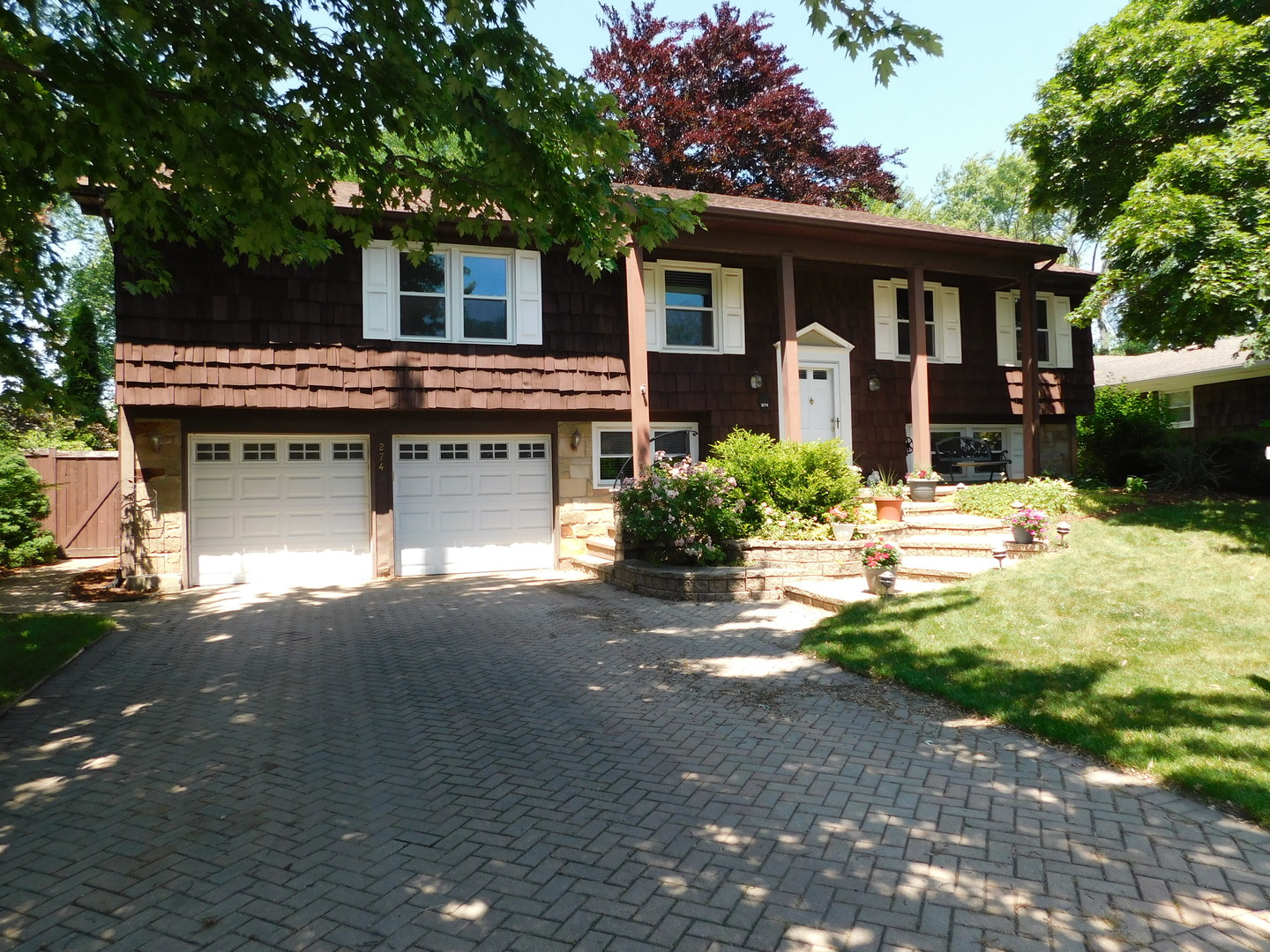 274 Timber Hill Road Buffalo Grove, IL 60089 - Photo 1 of 22 a view of a house with a yard