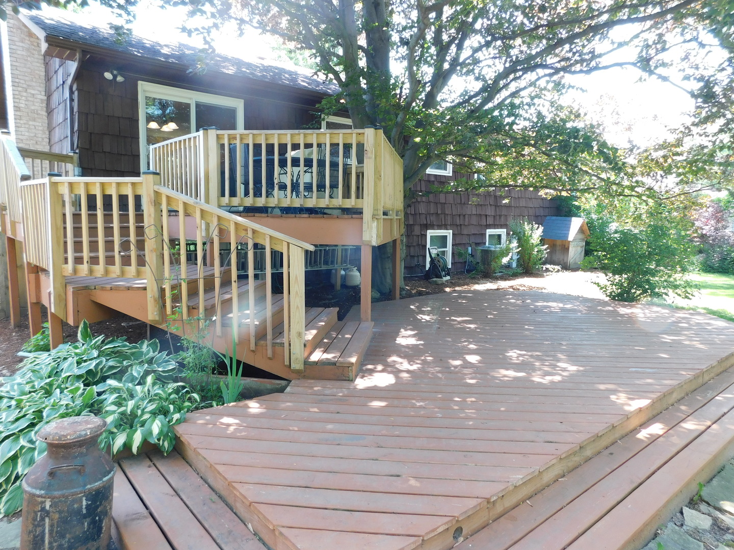 274 Timber Hill Road Buffalo Grove, IL 60089 - Photo 18 of 22 a view of a house with a deck