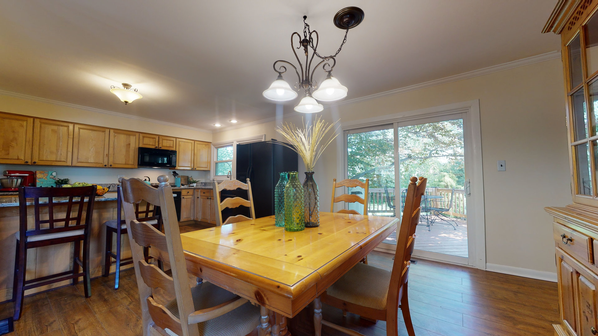 274 Timber Hill Road Buffalo Grove, IL 60089 - Photo 4 of 22 a view of a dining room with furniture window and wooden floor