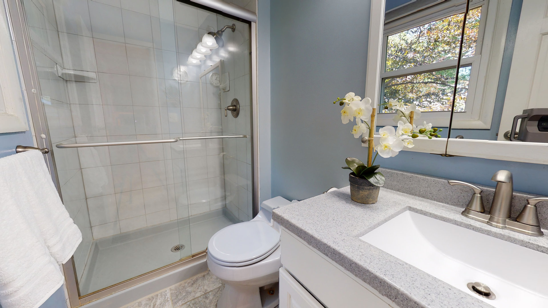 274 Timber Hill Road Buffalo Grove, IL 60089 - Photo 9 of 22 a bathroom with a sink a toilet and shower