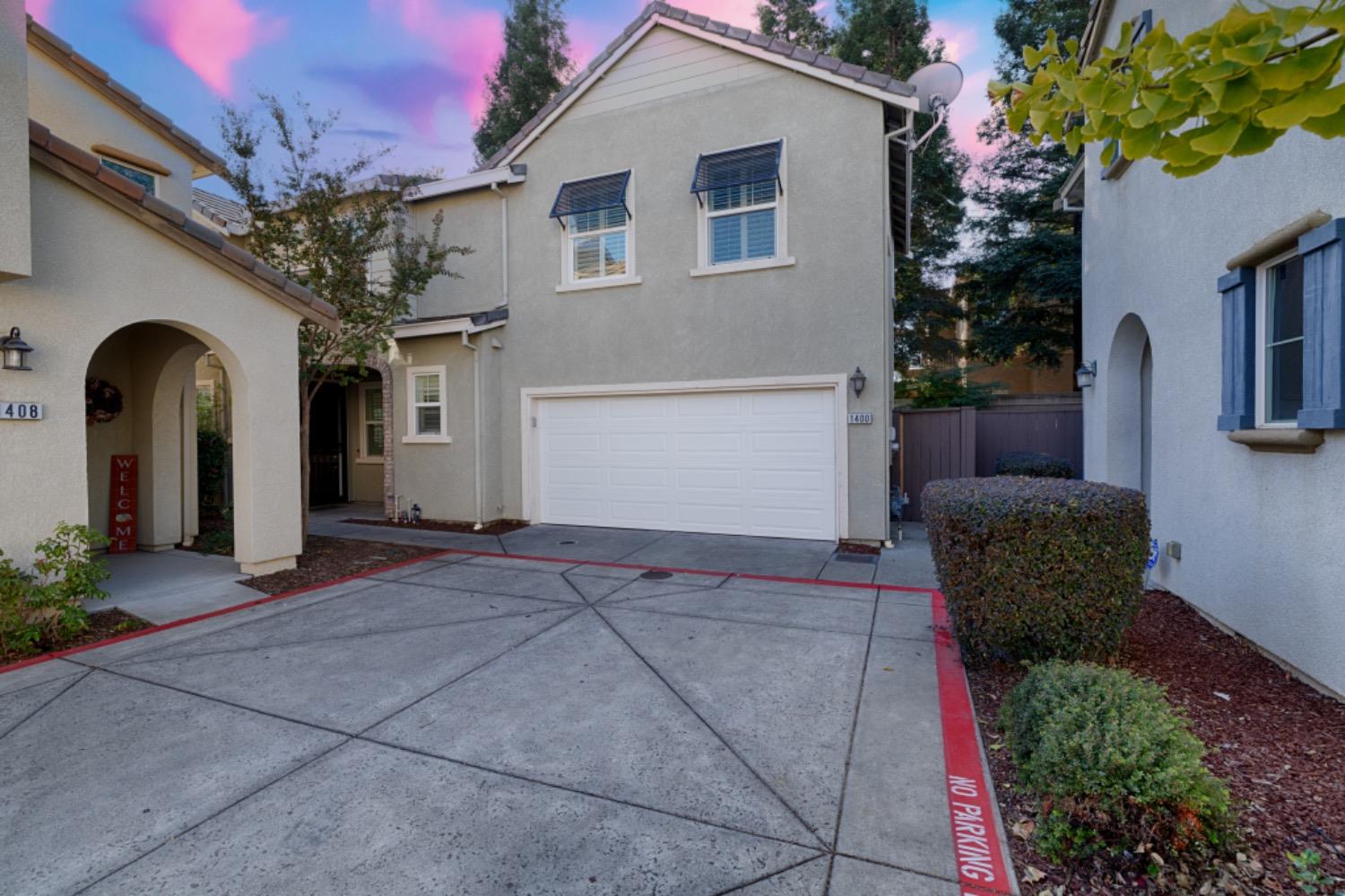 1400 Impressionist Loop Roseville, CA 95747 - Photo 1 of 1 a front view of a house with garden